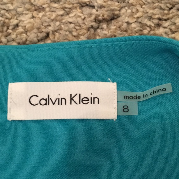 Calvin Klein sheath dress with faux wrap detail. Fully lined.  Size 8. Worn once - Picture 3 of 9